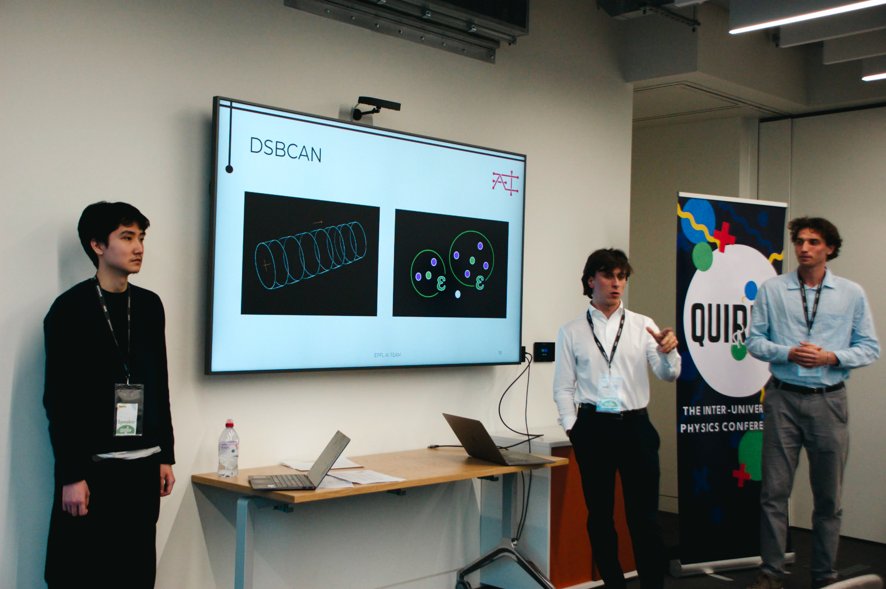 Two speakers presenting together on stage