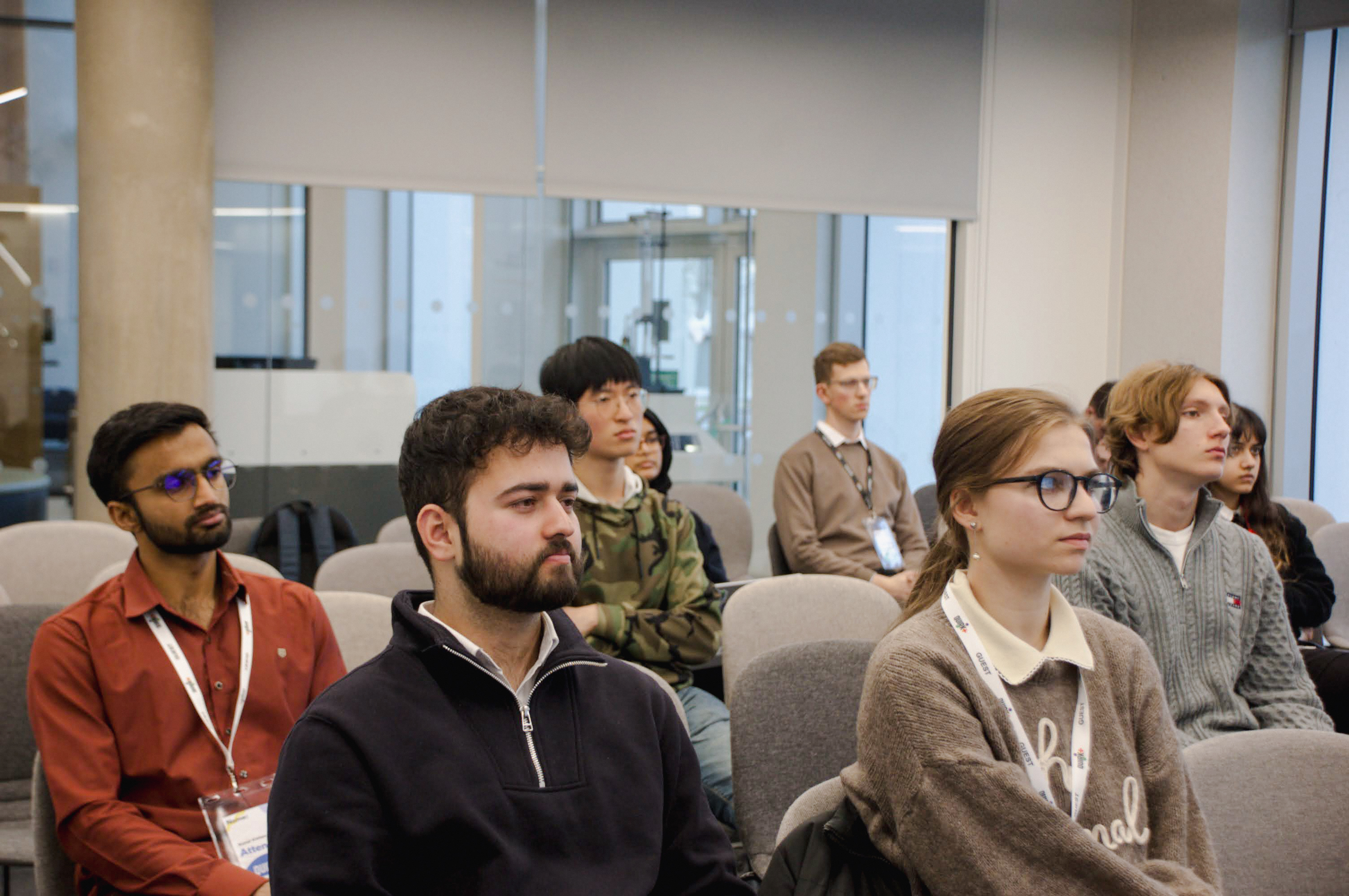 Audience members attentively listening